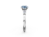 White gold Fancy Blue Round  Cut Diamond Solitaire Ring with Tapered Baguette Accents and Four-Prong Setting_59