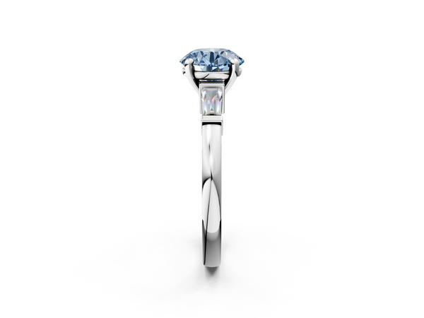 White gold Fancy Blue Round  Cut Diamond Solitaire Ring with Tapered Baguette Accents and Four-Prong Setting
