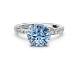 White gold Fancy Blue Round  Cut Diamond Solitaire with Pave Band and Four-Prong Setting