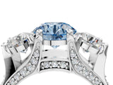 White gold Fancy Blue Round Cut Diamond Three-Stone Ring with Channel Set Band and Four-Prong Setting_65