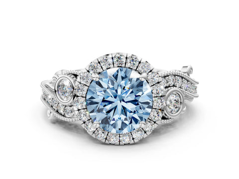 White gold Fancy Blue Round Cut Halo Diamond Ring with Milgrain and Bezel Accents on a Split Shank Band