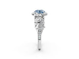 White gold Fancy Blue Round Cut Halo Diamond Ring with Milgrain and Bezel Accents on a Split Shank Band_8