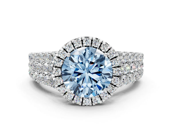 White gold Fancy Blue Round Cut Halo Pavé Diamond Engagement Ring with Split Shank and Four-Prong Setting