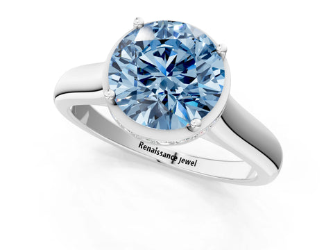 White gold Fancy Blue Round Cut Solitaire Diamond Engagement Ring with Four-Prong Setting and Tapered Band_1