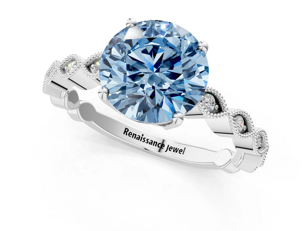 White gold Fancy Blue Round Cut Solitaire Diamond Ring with Infinity Twist Band and Four-Prong Setting