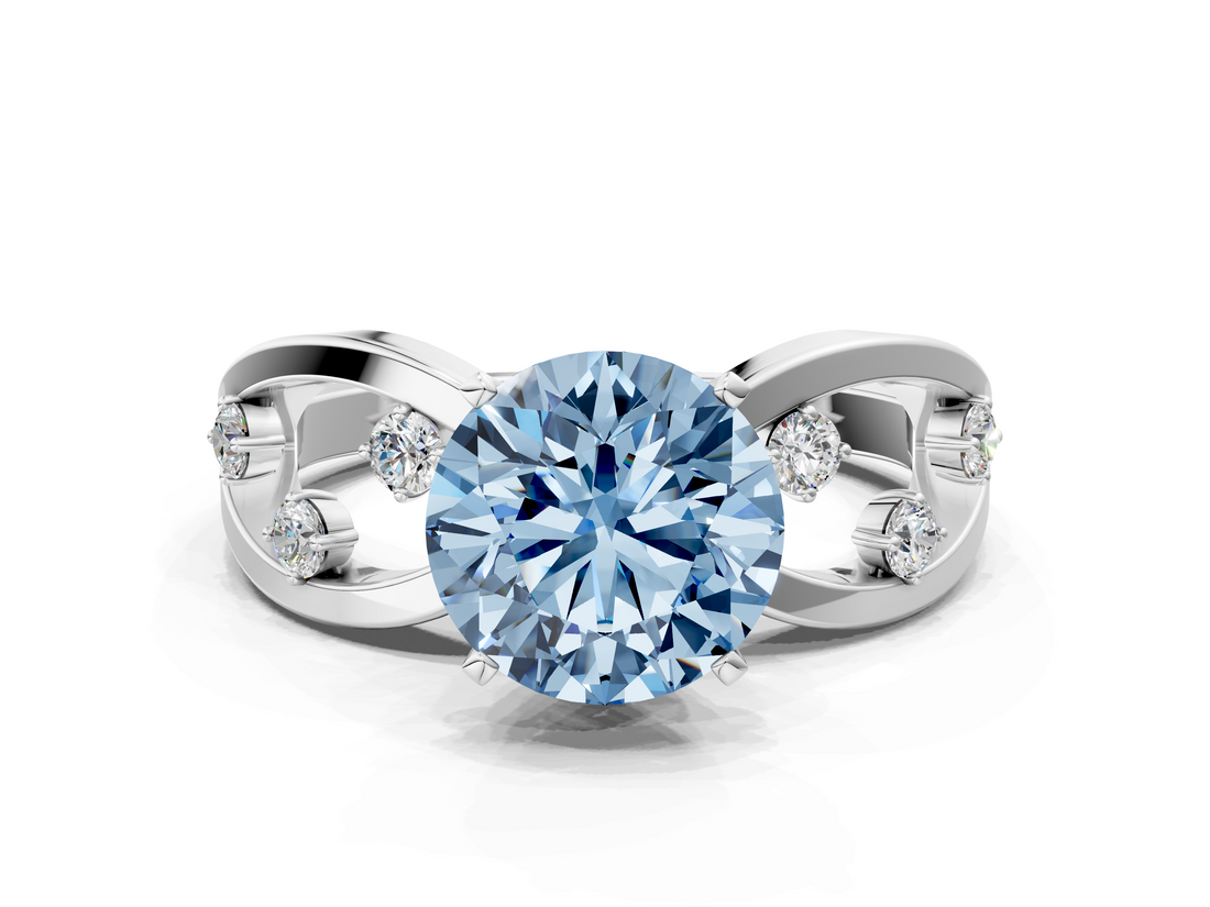White gold Fancy Blue Round  Cut Solitaire Diamond with Side Stones on Criss-Cross Band and Four-Prong Setting_3