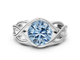 White gold Fancy Blue Round Cut Solitaire Intertwined Band Prong Setting Ring