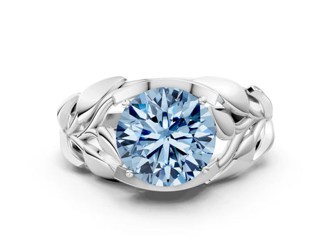 White gold Fancy Blue Round Cut Solitaire Leaf-Inspired Engagement Ring with Prong Setting
