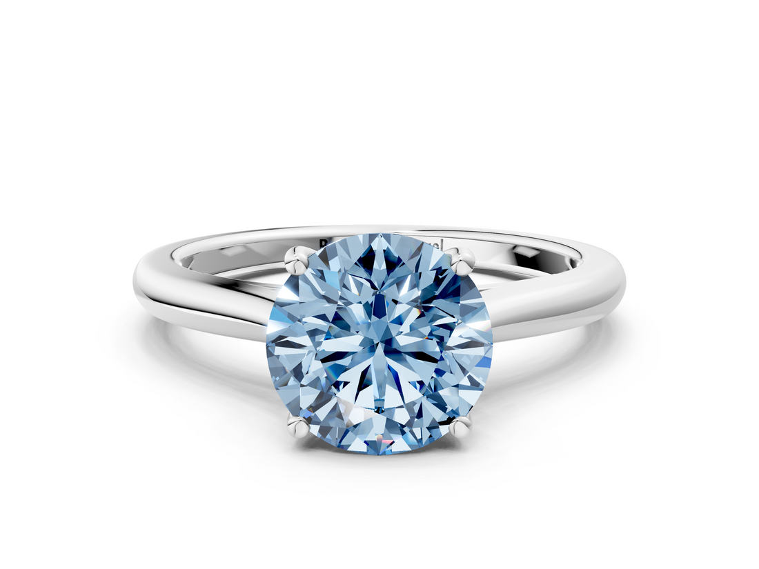White gold Fancy Blue Round  Cut Solitaire Ring with Cathedral Band and Four-Prong Setting_59