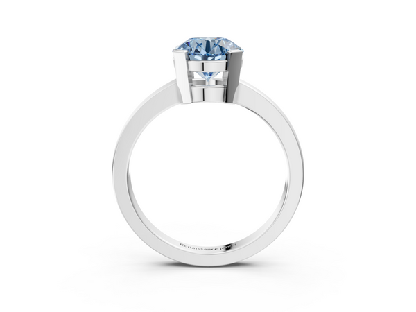 White gold Fancy Blue Round  Cut Solitaire Ring with Four-Prong Setting and Classic Band