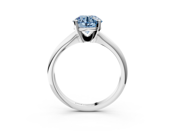 White gold Fancy Blue Round  Cut Solitaire Ring with Four-Prong Setting on a Classic Band