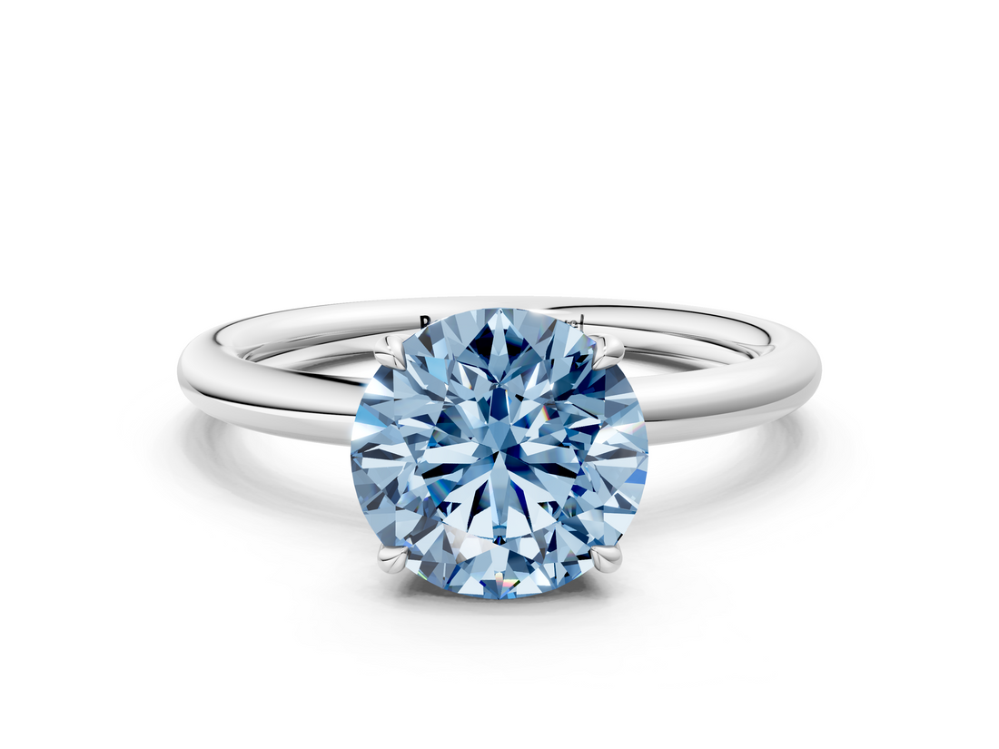 White gold Fancy Blue Round  Cut Solitaire Ring with Thin Band and Four-Prong Setting_16