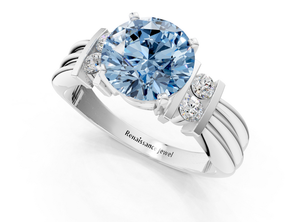 Platinum Fancy Blue Round  Cut Three-Stone Channel Set Ring with Bar Prongs