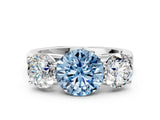 White gold Fancy Blue Round Cut Three-Stone Diamond Ring with Prong Setting on a Classic Band_12