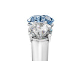 White gold Fancy Blue Round Cut Three-Stone Diamond Ring with Prong Setting on a Classic Band_17