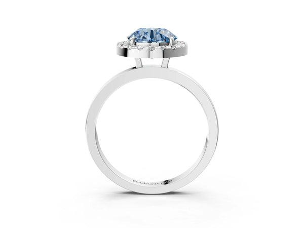 White gold Fancy Blue Round  Halo Diamond Solitaire with Pavé Band and Four-Prong Setting