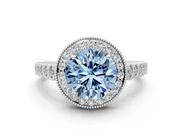 White gold Fancy Blue Round  Halo Milgrain Solitaire with Bezel Set Side Stones and Pave Band