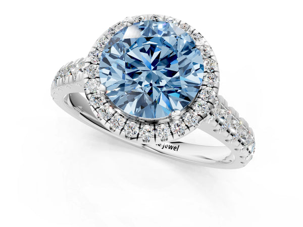 White gold Fancy Blue Round  Halo Pavé Diamond Engagement Ring with Four-Prong Setting