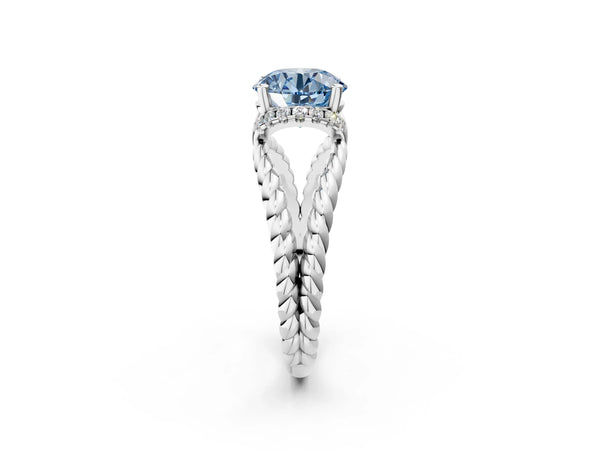 White gold Fancy Blue Round  Halo Twisted Band Four-Prong Ring