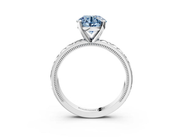 White gold Fancy Blue Round  Solitaire Diamond Engagement Ring with XO Engraved Band and Four-Prong Setting