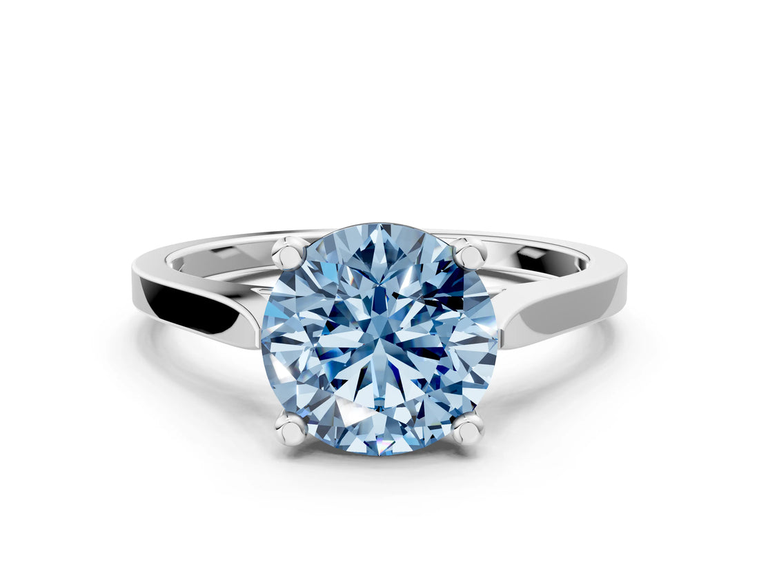 White gold Fancy Blue Round  Solitaire Diamond Ring with Four-Prong Setting and Tapered Band 1