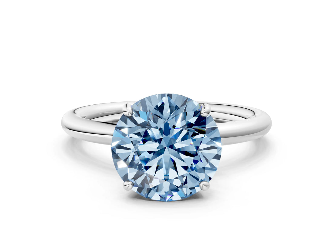 White gold Fancy Blue Round  Solitaire Diamond Ring with Four-Prong Setting on a Plain Band_32