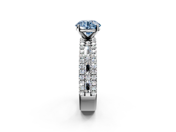 White gold Fancy Blue Round Cut Diamond Solitaire Ring with Pavé and Channel Set Band
