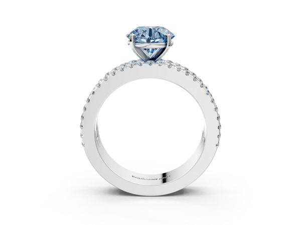 White gold Fancy Blue Round Cut Diamond Solitaire Ring with Pavé and Channel Set Band