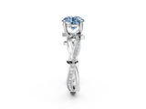 White gold Fancy Blue Round  Solitaire Twist Band with Pavé Accents and Four-Prong Setting_22