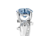 White gold Fancy Blue Round  Solitaire Twist Band with Pavé Accents and Four-Prong Setting_25