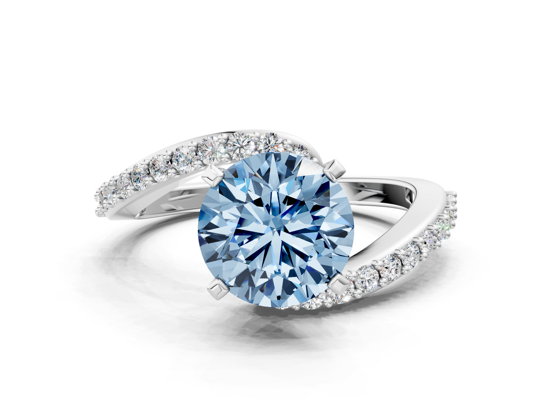 White gold Fancy Blue Round  Solitaire Twist Band with Pave Set Diamonds and Four-Prong Setting_132