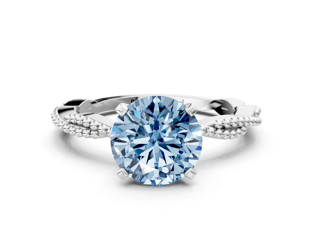 White gold Fancy Blue Round  Solitaire Twisted Band with Bead Prong Setting_399