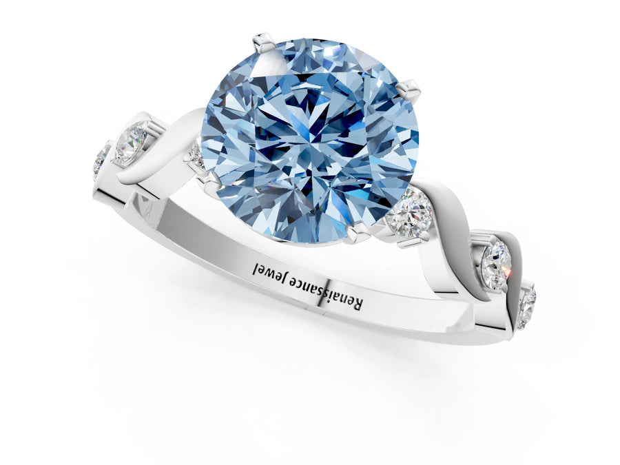 White gold Fancy Blue Round  Solitaire Twisted Band with Prong Setting