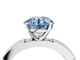 White gold Fancy Blue Round  Solitaire with Pavé Band and Four-Prong Setting_339