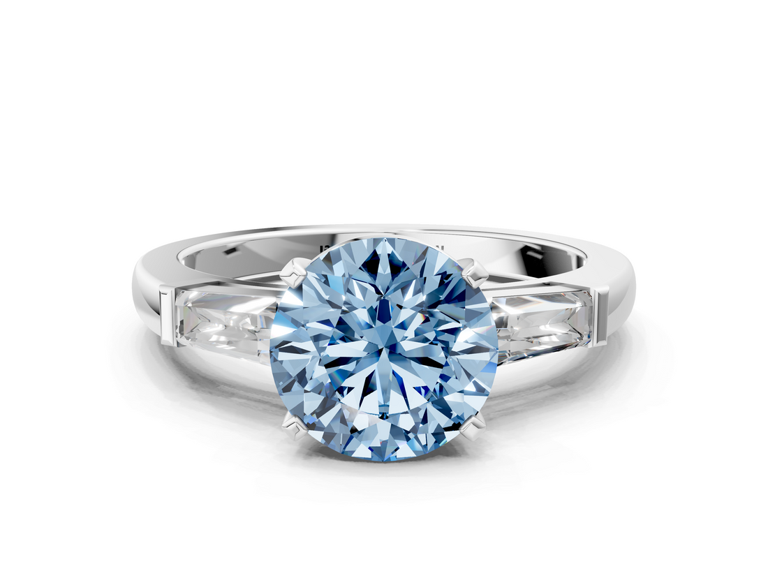 White gold Fancy Blue Round  Solitaire with Tapered Baguette Side Stones on a Classic Band with Four-Prong Setting_86