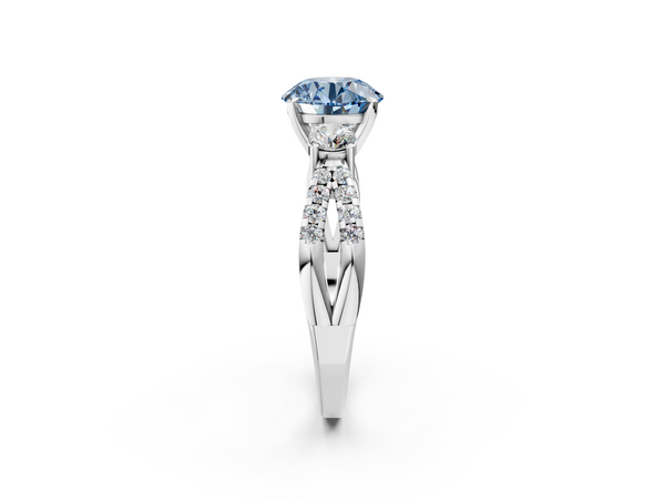 Platinum Fancy Blue Round Cut Diamond Three-Stone Ring with Pavé Split Shank and Four-Prong Setting