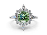 White gold Fancy Green Cushion Cut Halo Diamond Cluster Ring with Marquise and Round Stones on a White Gold Band with Prong Setting