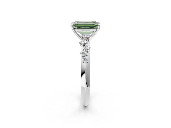 White gold Fancy Green Emerald Cut Diamond Cluster Side Stone Solitaire Ring with Prong Setting