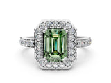 White gold Fancy Green Emerald Cut Diamond Halo Ring with Pavé Band and Prong Setting