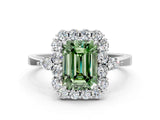 White gold Fancy Green Emerald Cut Diamond Halo Ring with Pear Side Stones and Prong Setting_75