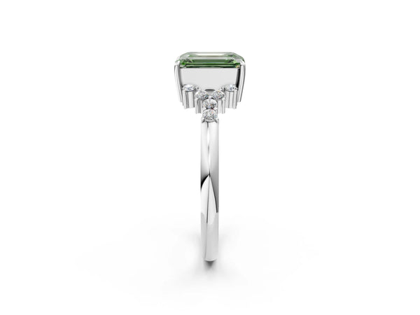 White gold Fancy Green Emerald Cut Diamond Ring with Side Stones and Four-Prong Setting