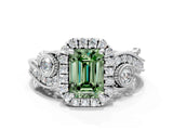 White gold Fancy Green Emerald Cut Halo Diamond Ring with Milgrain and Bezel Accents on a Split Shank Band