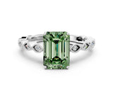 White gold Fancy Green Emerald Cut Solitaire Diamond Ring with Infinity Twist Band and Four-Prong Setting