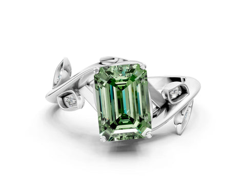 White gold Fancy Green Emerald Cut Solitaire Twist Engagement Ring with Leaf Accents and Prong Setting