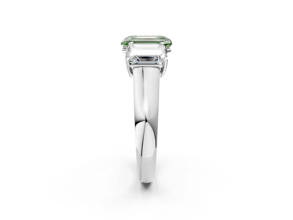 Platinum Fancy Green Emerald Cut Three-Stone Diamond Ring with Prong Setting on a Classic Band