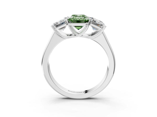 Platinum Fancy Green Emerald Cut Three-Stone Diamond Ring with Prong Setting on a Classic Band