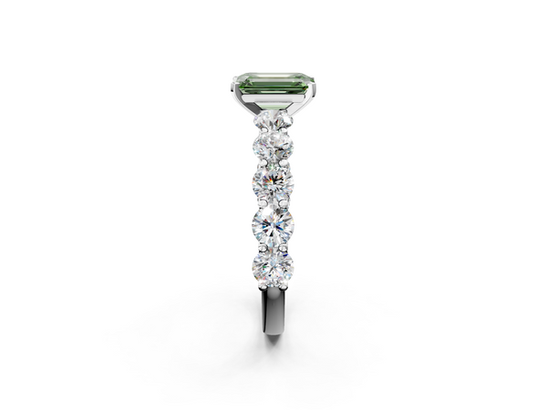 White gold Fancy Green Emerald Cut Diamond Prong Setting with Side Stones on a Pave Band