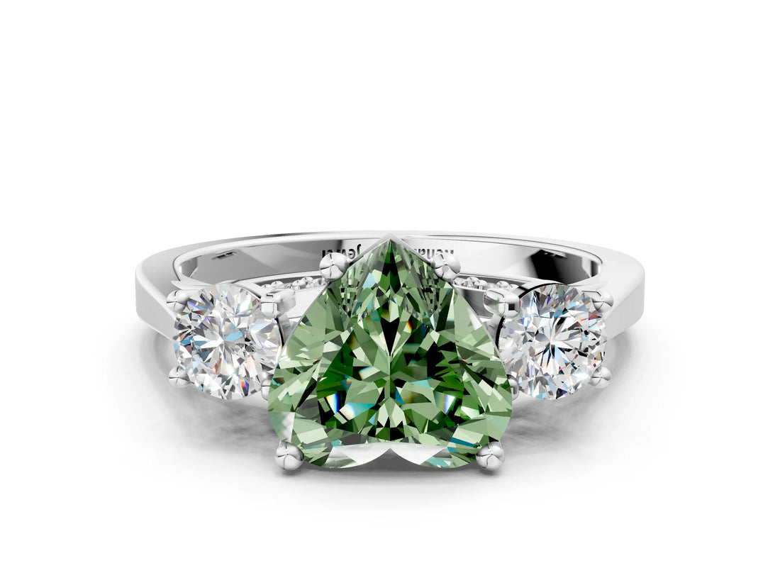 White gold Fancy Green Heart Cut Diamond Three-Stone Engagement Ring with Prong Setting and Pavé Band