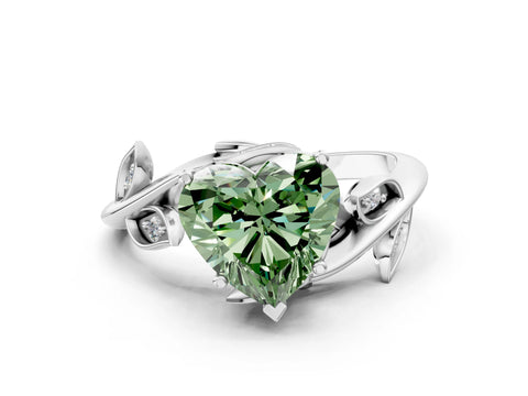 White gold Fancy Green Heart Cut Solitaire Twist Engagement Ring with Leaf Accents and Prong Setting