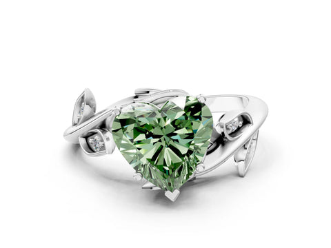 White gold Fancy Green Heart Cut Solitaire Twist Engagement Ring with Leaf Accents and Prong Setting
